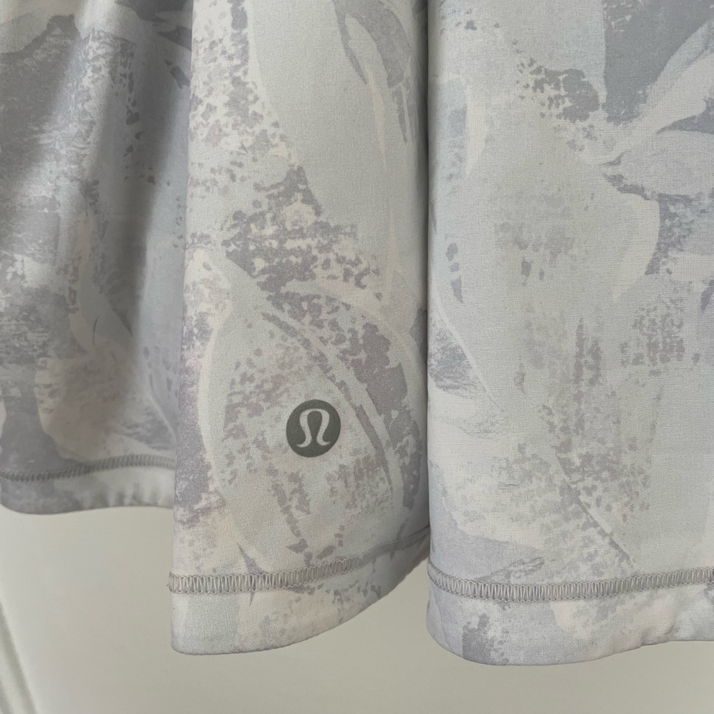 Size 4 or small, white tennis skirt with shorts.